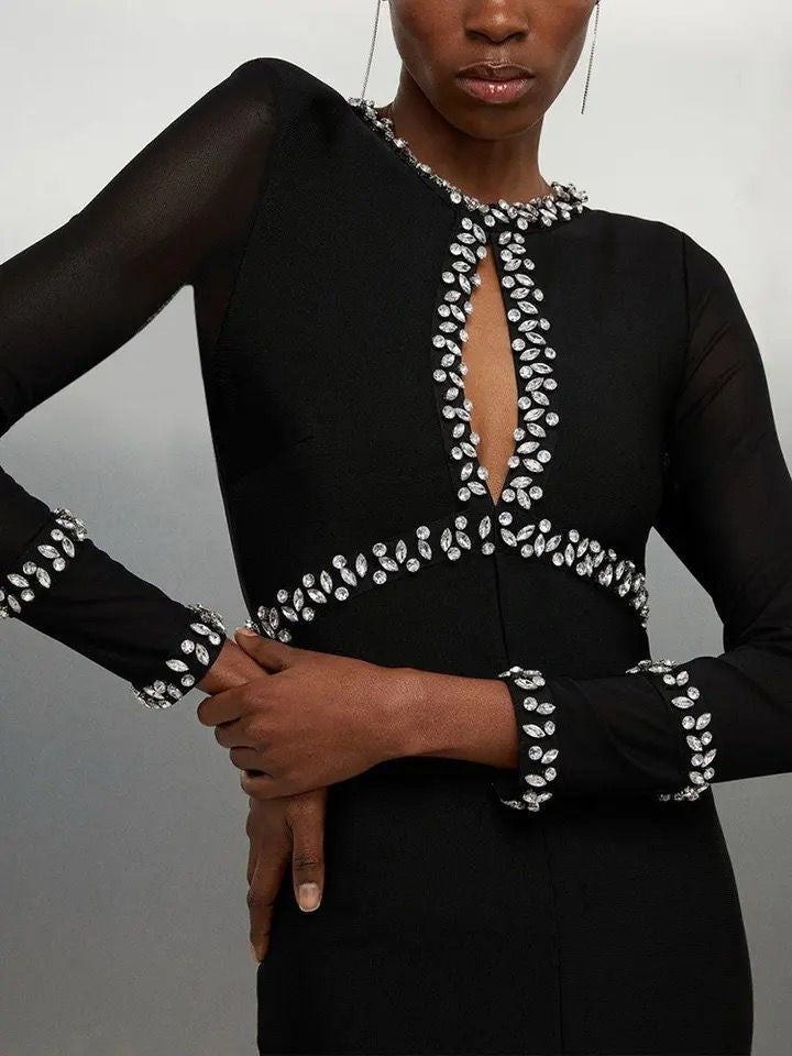 Vestido negro abert pecho