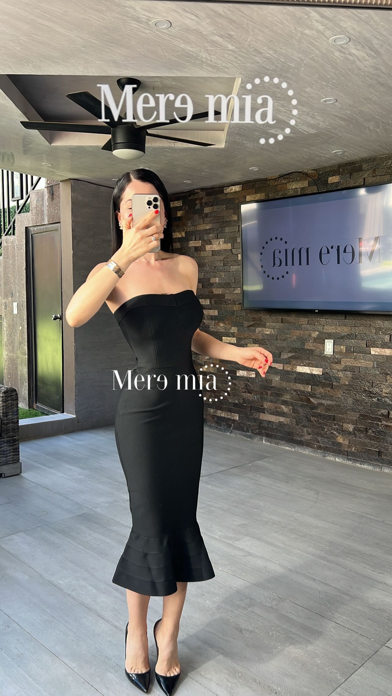 Vestido negro olan abajo