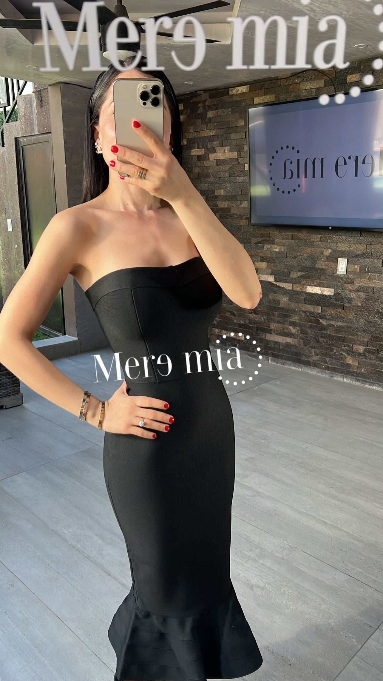 Vestido negro olan abajo