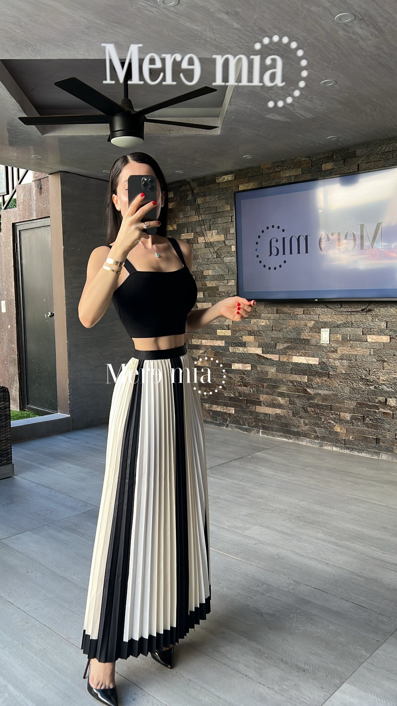 Falda plisada rayas negras