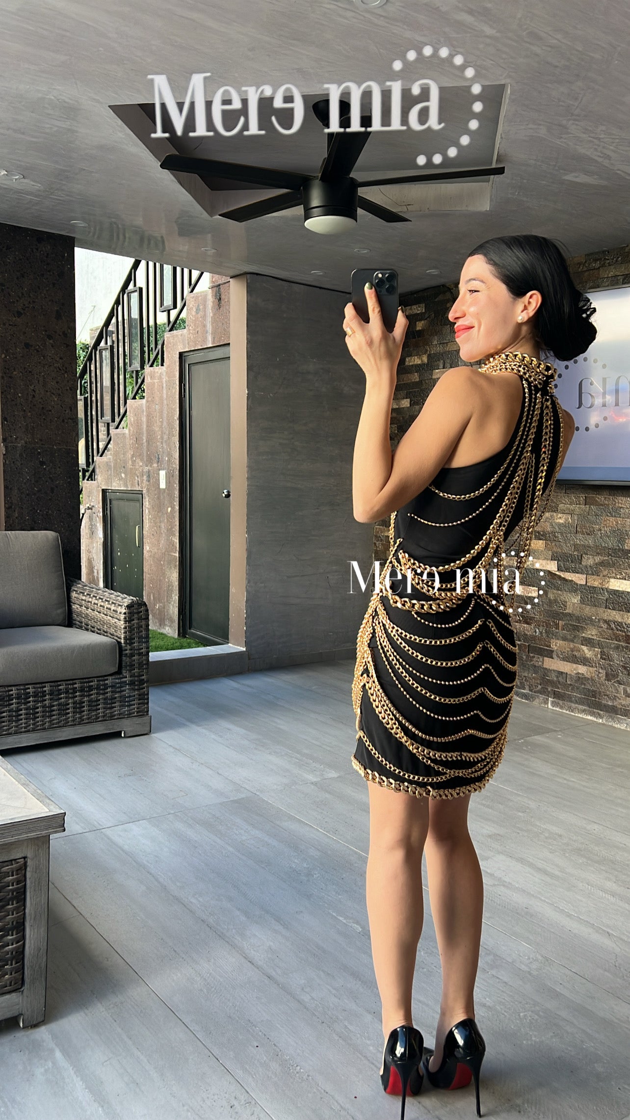 Vestido negro cadenas